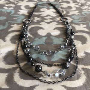 Long, layered necklace